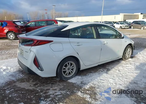 2021 Toyota Prius Prime Limited z USA, uszkodzony, nr VIN JTDKAMFP6M3174953